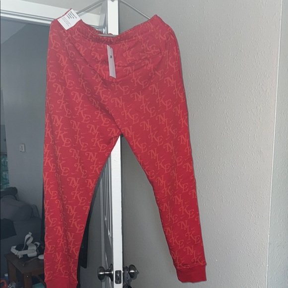 Nike Red Sweatpants with Logo Pattern - Picture 1 of 4